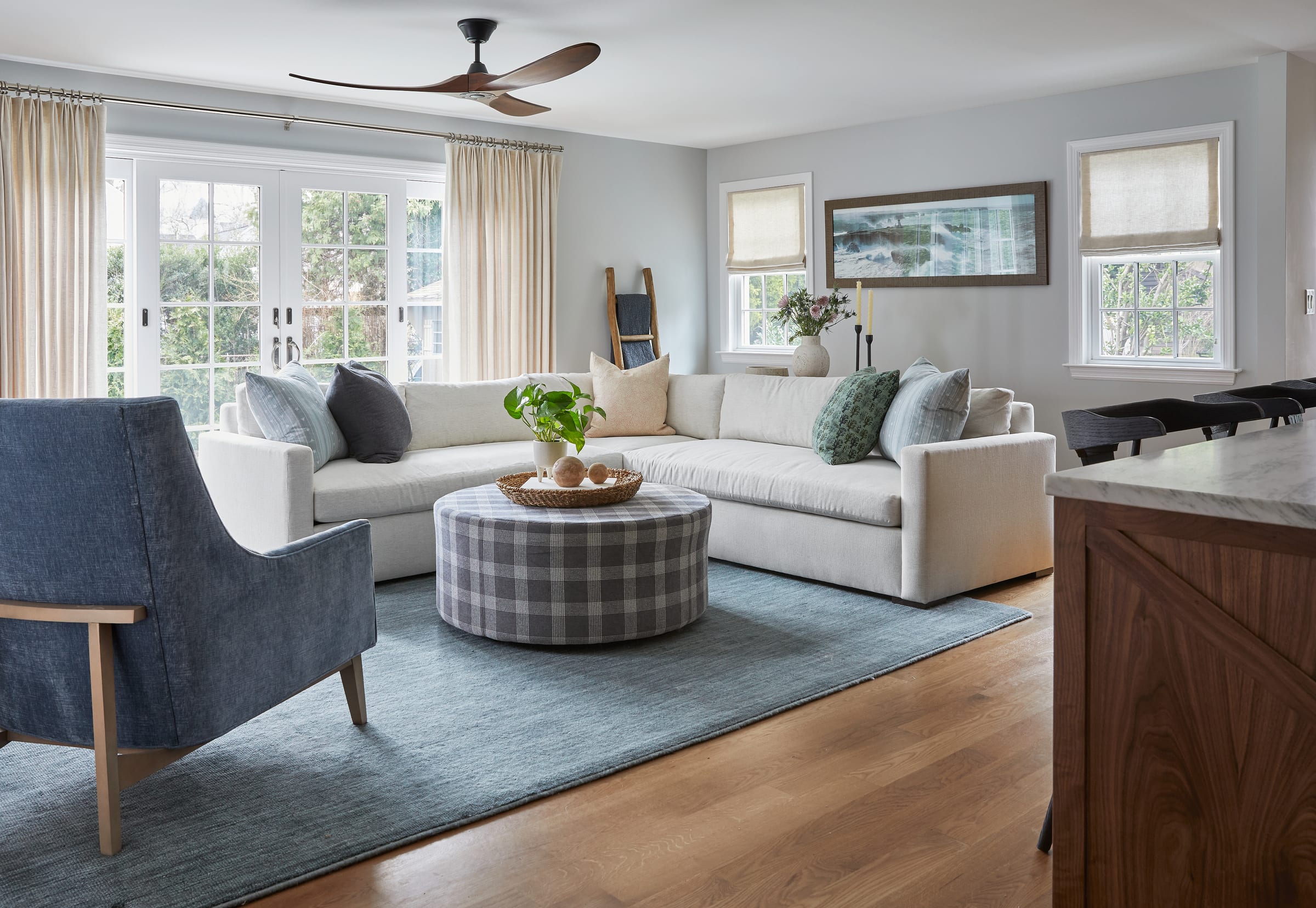 Living room in a design-led luxury interior renovation in Westfield, New Jersey by Ellie Mroz Design.